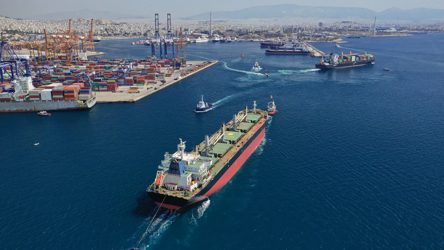 Aerial drone photo of industrial loading - unloading logistics container terminal area of Perama, Piraeus port, Attica, Greece